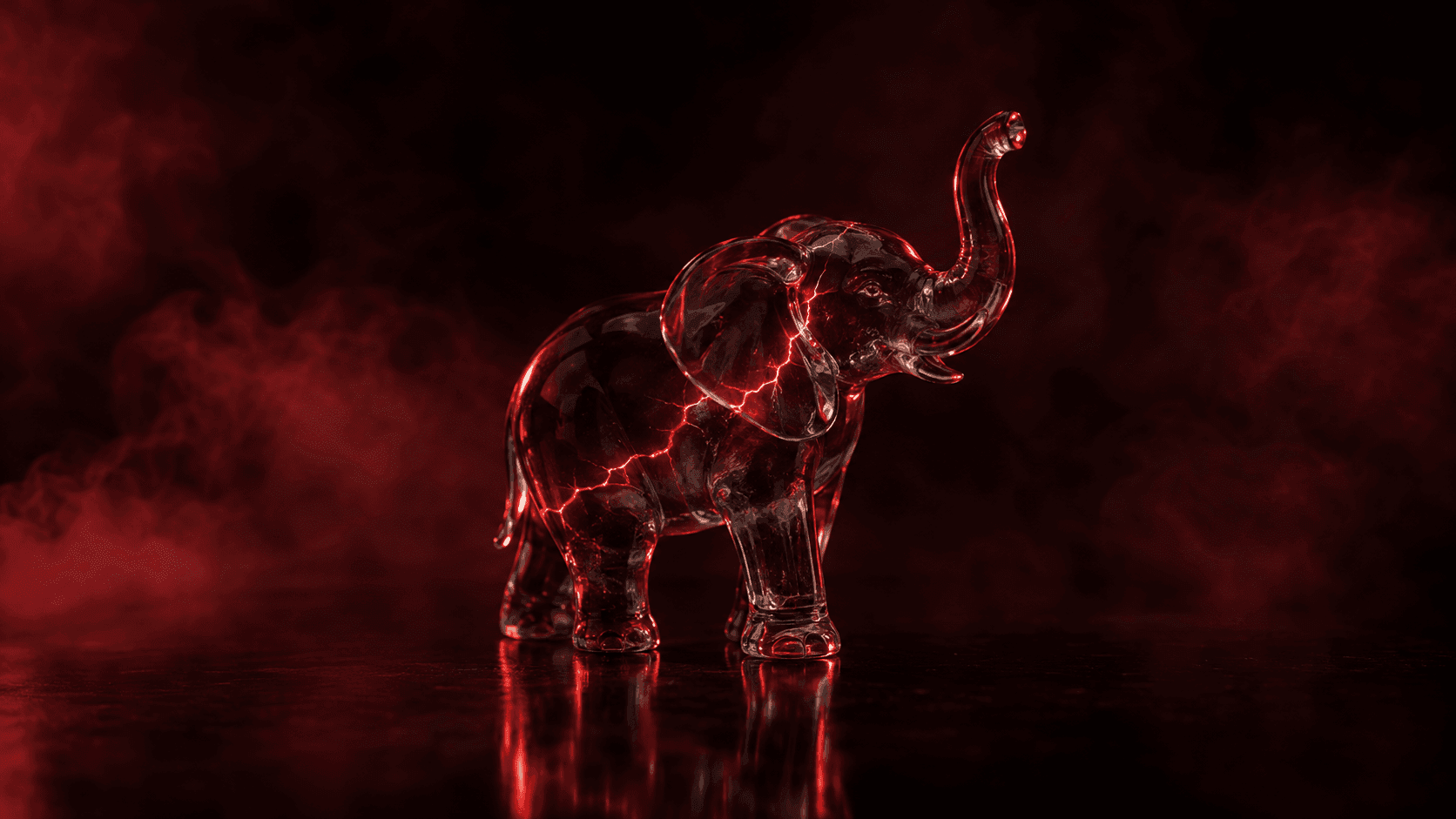 Patung gajah kecil dari kaca di permukaan gelap, retakan merah menyala menjalar di badannya
