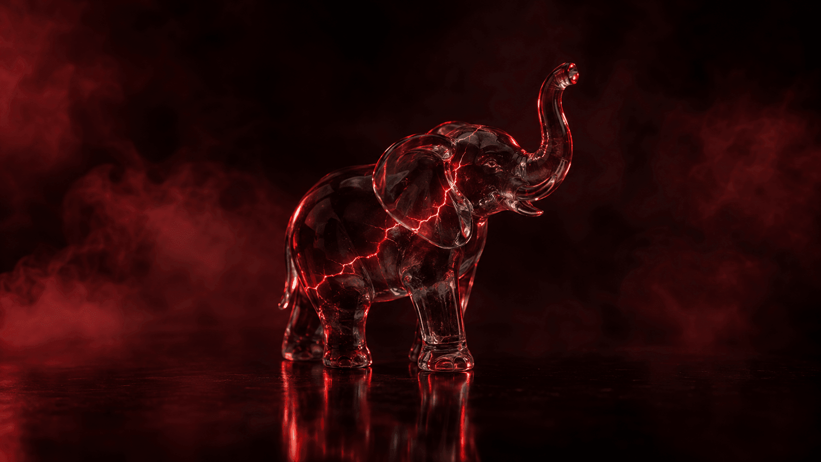 Patung gajah kecil dari kaca di permukaan gelap, retakan merah menyala menjalar di badannya